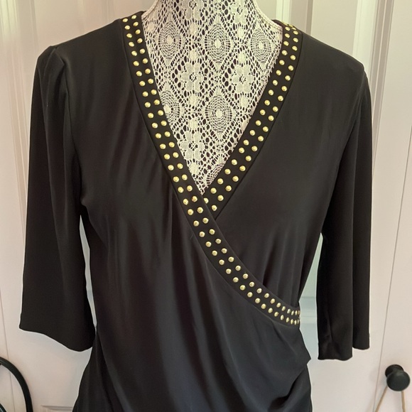 Elegant LBD w/crossover neckline & faux wrap skirt w/gold stud detail. - Picture 2 of 14